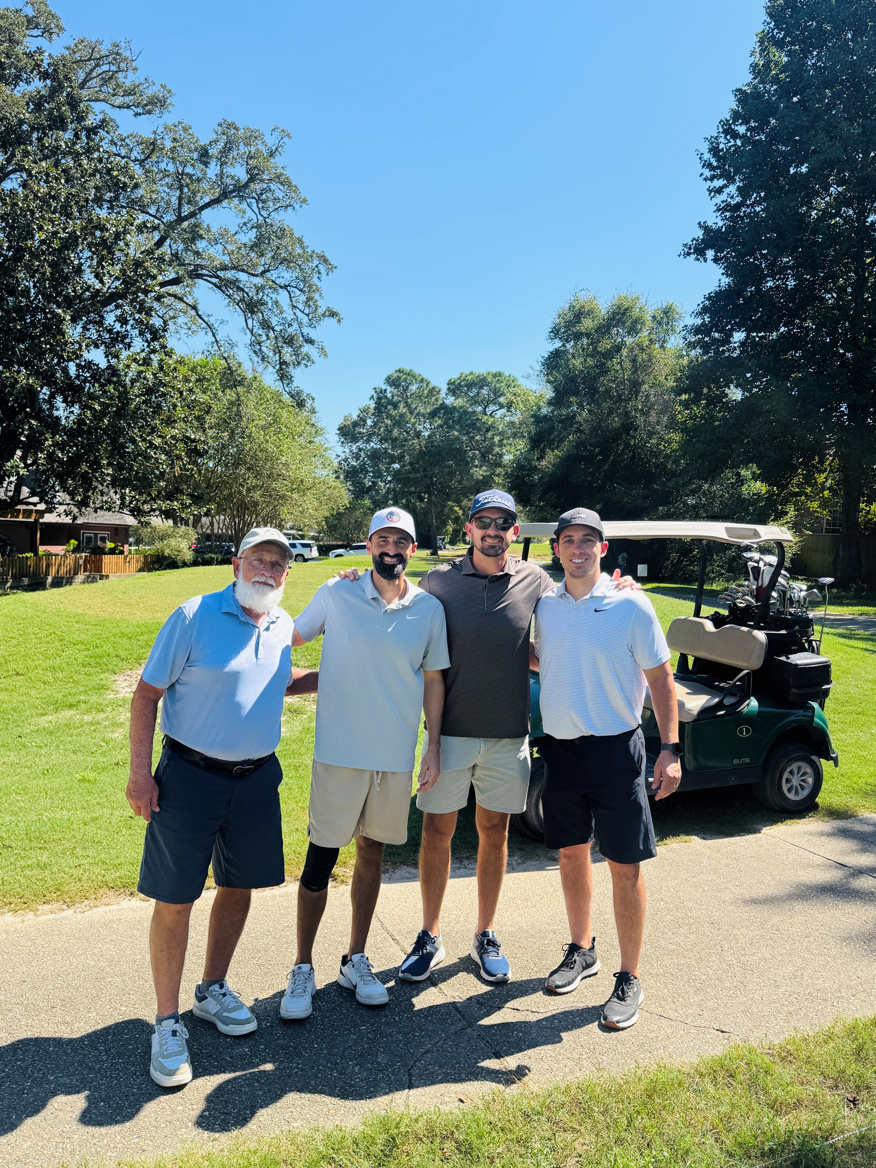 Four members of the Slone Doors golf team at the 2026 ABC North Florida Golf Tournament.